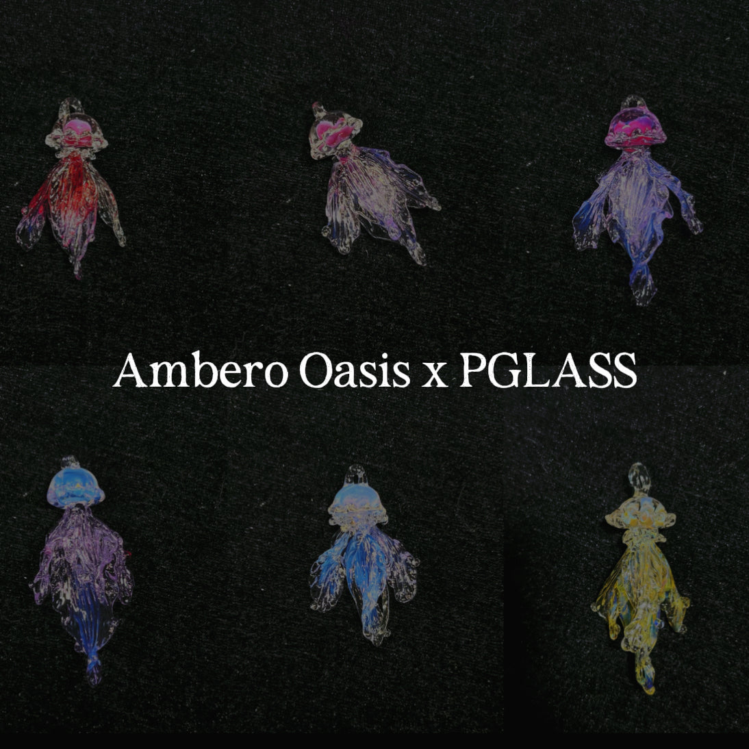 Ethereal hand-blown glass jellyfish pendant necklace by Ambero Oasis, featuring clear glass with amber and yellow internal details.
