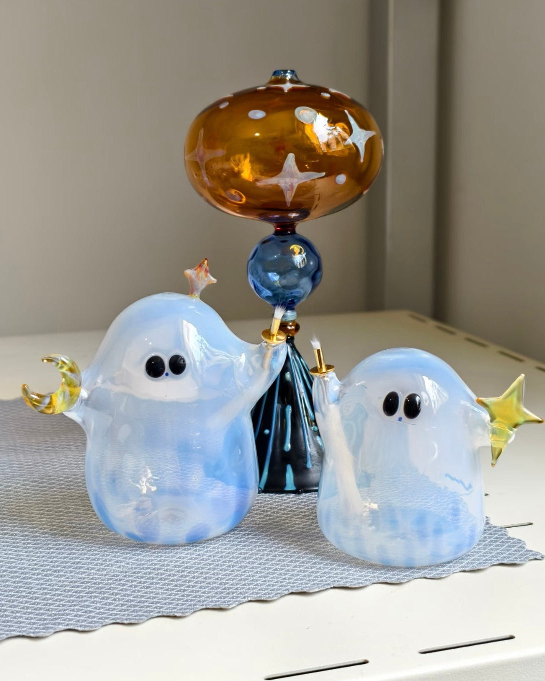 Cute Halloween ghost decor with star detail – glass art closeup