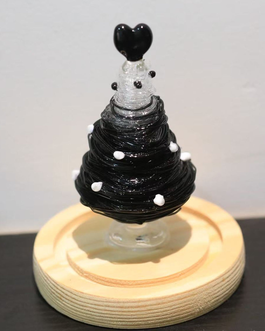 Gothic black glass Christmas tree centerpiece with heart topper and wooden base