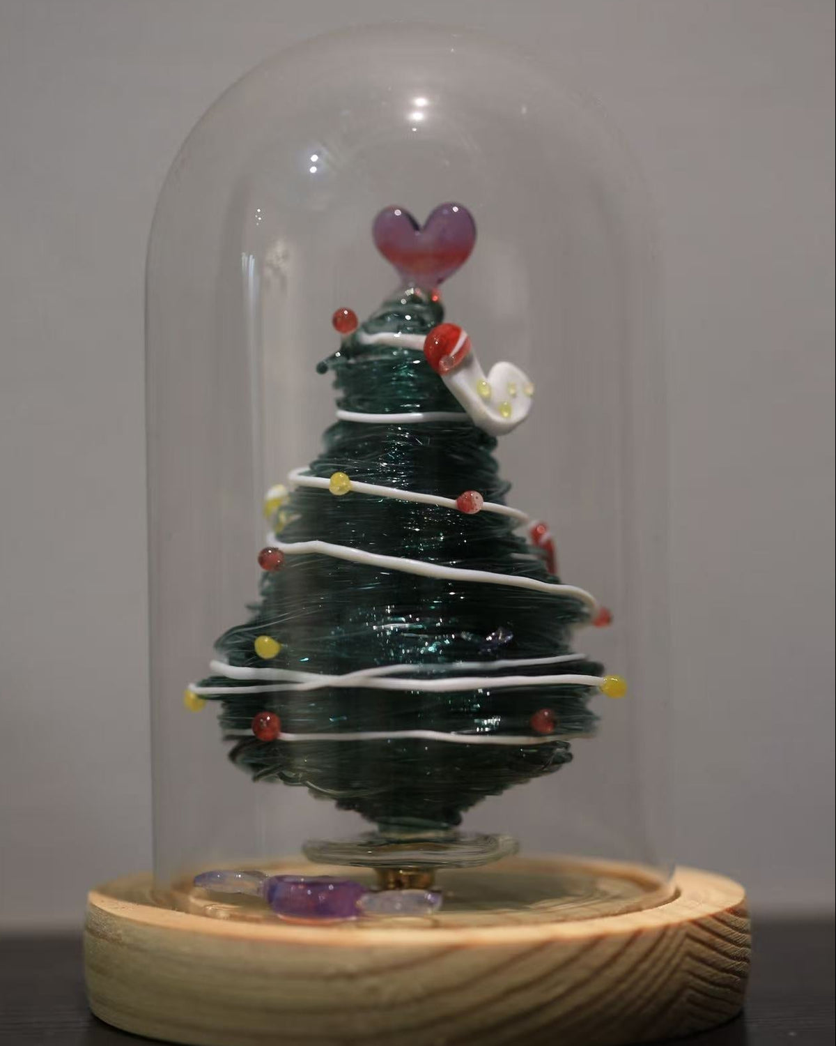 Green gradient glass Christmas tree with heart topper and wooden base
