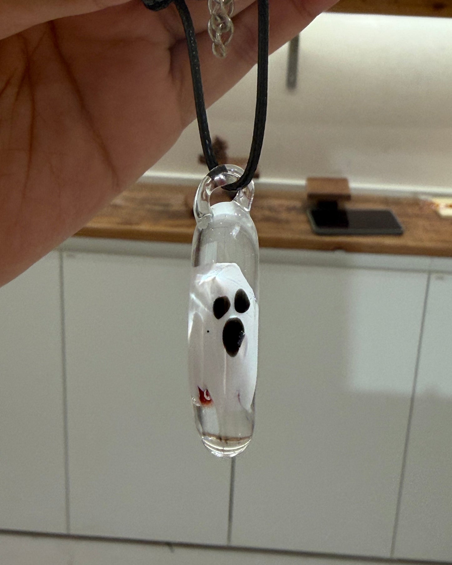 Handmade glass ghost pendant necklace with red flame detail, unique Halloween gift jewelry